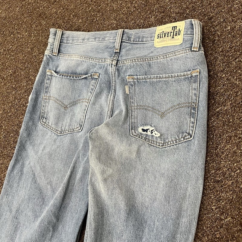 Levis Jeans Womens Size 30 Waist Blue Light Wash '94 Baggy Distressed Silver Tab gallery