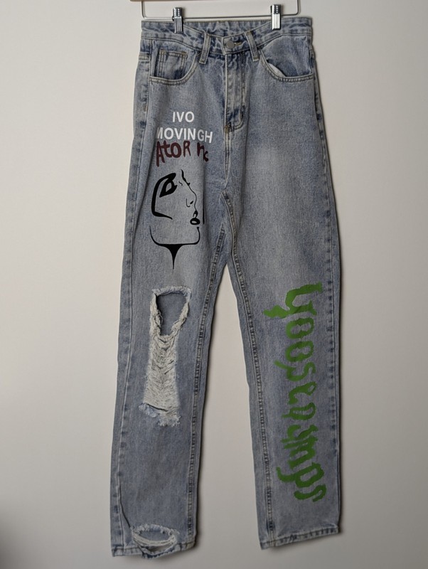 Jeans with Abstract Face & Text Graphic – Size 13.5″…