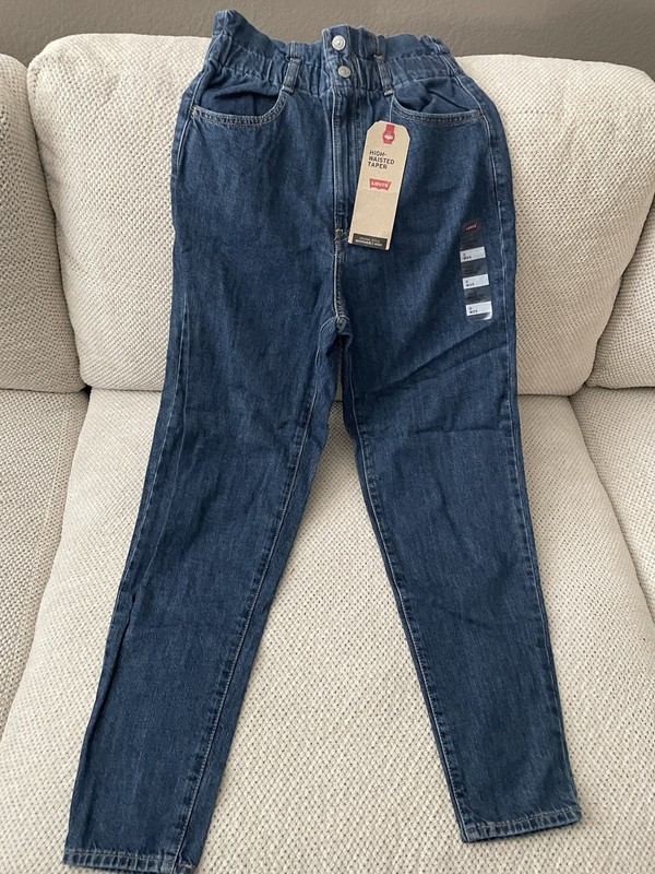Levi’s Women’s Blue Solid Denim Tapered Jeans Size 0 5-Pocket Button Logo